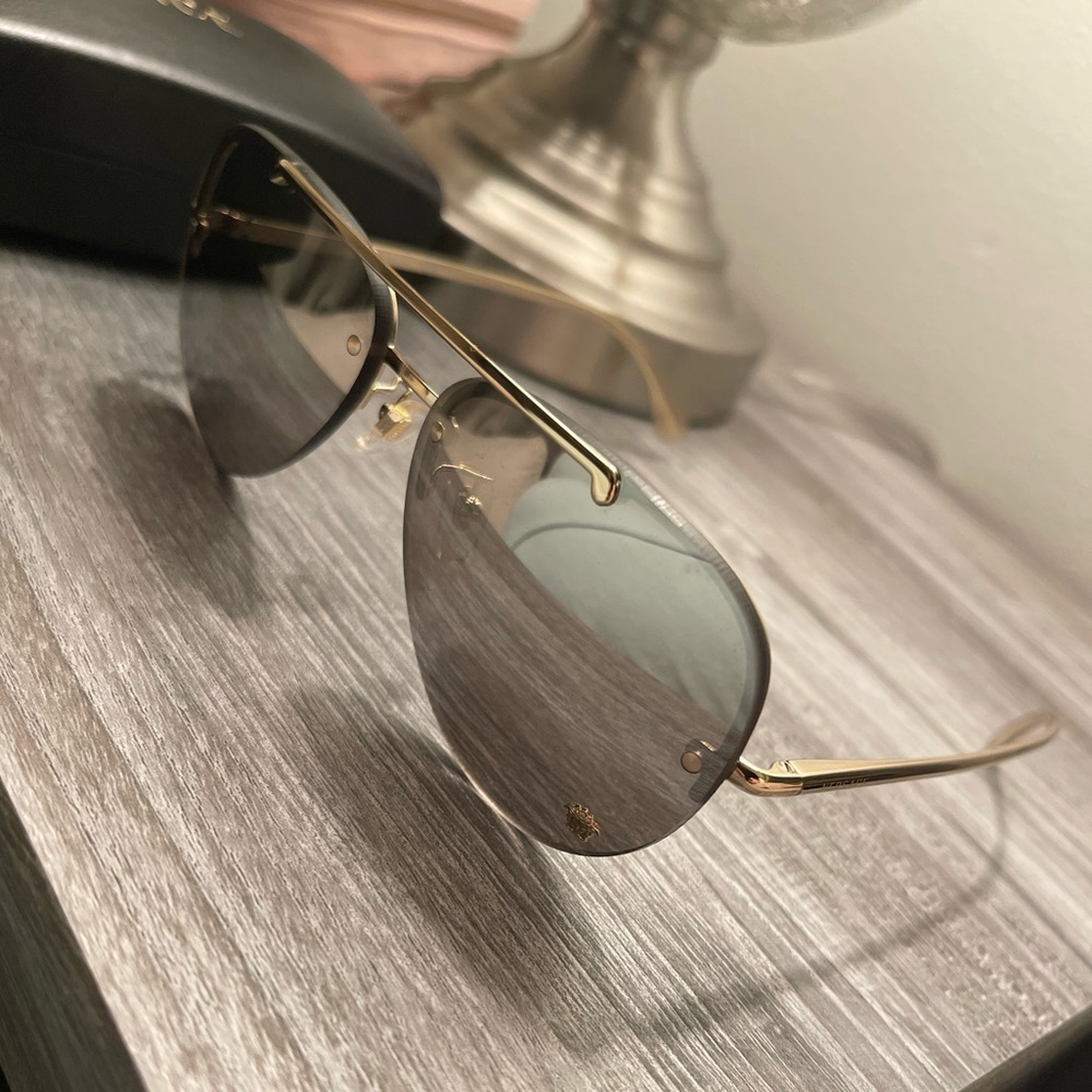 Selling versace mirrored sunglasses. Very good condition barely used.